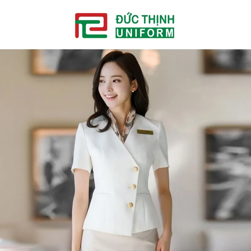 Đồng phục nữ lễ tân màu trắng tinh tế
